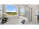 Bright bathroom featuring a soaking tub, a glass enclosed shower, and a large window at 3730 Near Star Ln, Cumming, GA 30028