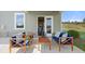 Relaxing outdoor patio with comfortable seating, perfect for enjoying the backyard view at 3730 Near Star Ln, Cumming, GA 30028