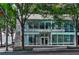 Modern MidCity Lofts building featuring a stone facade and expansive glass windows at 845 Spring Nw St # 322, Atlanta, GA 30308