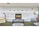 Stylish fireplace with decorative tile surround, adjacent seating, and a sleek, modern design at 845 Spring Nw St # 322, Atlanta, GA 30308