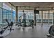 Modern gym with workout equipment and floor-to-ceiling windows, perfect for staying active and fit at 845 Spring Nw St # 322, Atlanta, GA 30308