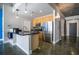 Modern kitchen with stainless steel appliances, granite countertops, and a view to the living area at 845 Spring Nw St # 322, Atlanta, GA 30308