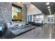 Spacious lobby with stone accent wall, modern art, and reception area, enhancing the building's appeal at 845 Spring Nw St # 322, Atlanta, GA 30308