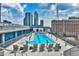 Enjoy the rooftop pool, lounge chairs, and city skyline views from this luxurious community amenity at 845 Spring Nw St # 322, Atlanta, GA 30308
