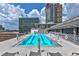 Relax in style at the rooftop pool featuring comfortable lounge seating and panoramic city views at 845 Spring Nw St # 322, Atlanta, GA 30308