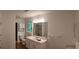 Bathroom featuring vanity, toilet, and shower/tub combo at 3875 Wintergreen Ct, Marietta, GA 30062
