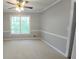 Light-filled bedroom featuring soft carpet, and neutral wall paint enhancing the cozy ambiance at 3875 Wintergreen Ct, Marietta, GA 30062