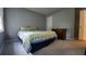 Comfortable bedroom with a plush queen bed, neutral walls, and natural light at 3875 Wintergreen Ct, Marietta, GA 30062