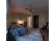 Cozy bedroom with a twin bed, ceiling fan, and plenty of room, perfect for customization at 3875 Wintergreen Ct, Marietta, GA 30062