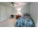 Cozy bedroom featuring a single bed, ceiling fan and a small desk area at 3875 Wintergreen Ct, Marietta, GA 30062