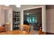Inviting living room with large window, neutral decor, and seamless flow from the dining area at 3875 Wintergreen Ct, Marietta, GA 30062