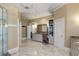 Spacious bathroom with granite countertops, marble tile flooring, and a glass enclosed shower at 715 Newport Holw, Alpharetta, GA 30005