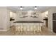Large open concept kitchen features a large island with seating and stainless steel appliances at 715 Newport Holw, Alpharetta, GA 30005