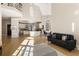 Spacious living space that includes open floor plan, breakfast nook, and fireplace with cathedral ceilings at 715 Newport Holw, Alpharetta, GA 30005