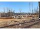 Spacious backyard with wood fence, offering privacy and room to roam at 814 Harmony Rd, Temple, GA 30179
