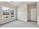 Bedroom with vaulted ceiling, large window, and a closet creating a peaceful retreat at 814 Harmony Rd, Temple, GA 30179