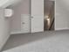 A well-lit bonus room with carpeted floors, windows, and wall trim ready to be an office, bedroom, or game room at 814 Harmony Rd, Temple, GA 30179