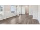 Elegant dining room with wainscoting, wood-look floors, and views of the entryway at 814 Harmony Rd, Temple, GA 30179