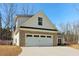 Lovely home featuring a two-car garage with a large driveway at 814 Harmony Rd, Temple, GA 30179