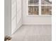 Light filled bedroom featuring carpet and a window providing natural light at 1059 Blue Juniper Cir, Loganville, GA 30052