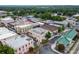 An aerial view of a charming downtown area showcases the unique architecture and vibrant community at 2108 Boxwood Circle Se, Conyers, GA 30094