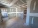 The interior of the home shows a bedroom with an unfinished construction of sheetrock walls and ceiling at 2108 Boxwood Circle Se, Conyers, GA 30094