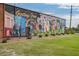 Exterior wall of a building showing a colorful mural saying 'Greetings from CONYERS' at 2108 Boxwood Circle Se, Conyers, GA 30094