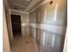 Hallway with unfinished walls provides an opportunity to create a seamless flow and personalized aesthetic at 2108 Boxwood Circle Se, Conyers, GA 30094