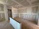 Living room area under construction showcases open layout, drywall, and potential for buyer customization at 2108 Boxwood Circle Se, Conyers, GA 30094