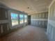 Large living room under construction with large bright windows and drywall ready for customization at 2108 Boxwood Circle Se, Conyers, GA 30094