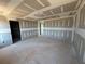 Open living room with unfinished walls ready for transformation into a welcoming and stylish space at 2108 Boxwood Circle Se, Conyers, GA 30094