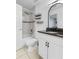 This bathroom features granite countertops, a shower-tub combo, and modern fixtures at 3103 Santa Fe Pkwy, Atlanta, GA 30350