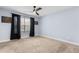 Serene bedroom with carpet, light blue walls, and window with black curtains at 3103 Santa Fe Pkwy, Atlanta, GA 30350