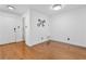 Bright living room with hardwood floors, white walls, and modern accents at 3103 Santa Fe Pkwy, Atlanta, GA 30350