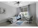 Bright bedroom featuring natural light, simple decor, and a comfortable chair at 805 Dempsey Ct, Marietta, GA 30064