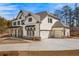 Expansive property boasts a three-car garage and beautiful architectural details at 805 Dempsey Ct, Marietta, GA 30064