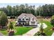 Beautiful two-story home with a manicured lawn, complemented by mature trees at 805 Dempsey Ct, Marietta, GA 30064