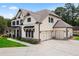 Beautiful two-story home with a two-car garage and well-maintained landscaping at 805 Dempsey Ct, Marietta, GA 30064