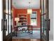 Stylish home office showcases vibrant walls, custom shelving, and a modern desk at 805 Dempsey Ct, Marietta, GA 30064