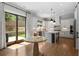 Bright kitchen featuring stainless steel appliances, a central island, and sliding glass doors to the backyard at 805 Dempsey Ct, Marietta, GA 30064