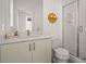 Modern bathroom featuring a sleek vanity, walk-in shower, and stylish fixtures creating a clean and functional space at 201 New St # 1102-8, Decatur, GA 30030