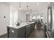 Modern kitchen featuring white countertops, stainless steel appliances, and an open concept view at 201 New St # 1102-8, Decatur, GA 30030