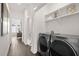 Convenient laundry area with side-by-side washer and dryer at 201 New St # 1102-8, Decatur, GA 30030