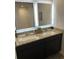 Bathroom featuring a double sink vanity with granite countertop and subway tiled shower/tub at 746 Great Oak Pl, Villa Rica, GA 30180
