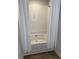 Bathroom featuring a tub, subway tile, and a shower curtain at 746 Great Oak Pl, Villa Rica, GA 30180