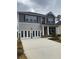 Beautiful two-story home with a spacious driveway and a covered front porch at 746 Great Oak Pl, Villa Rica, GA 30180