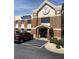 Exterior view of Peachtree Immediate Care building, featuring brick facade, signage, and parking area at 746 Great Oak Pl, Villa Rica, GA 30180