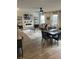 Spacious living room with wood-look floors, a modern fireplace, and stylish decor at 746 Great Oak Pl, Villa Rica, GA 30180