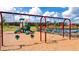 Neighborhood playground featuring swings, slides, and climbing structures, located near the pool at 165 Aster Avenue, Locust Grove, GA 30248