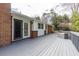 Wide back deck perfect for gatherings, featuring access to the home's interior at 18 Brandon Ridge Dr, Sandy Springs, GA 30328